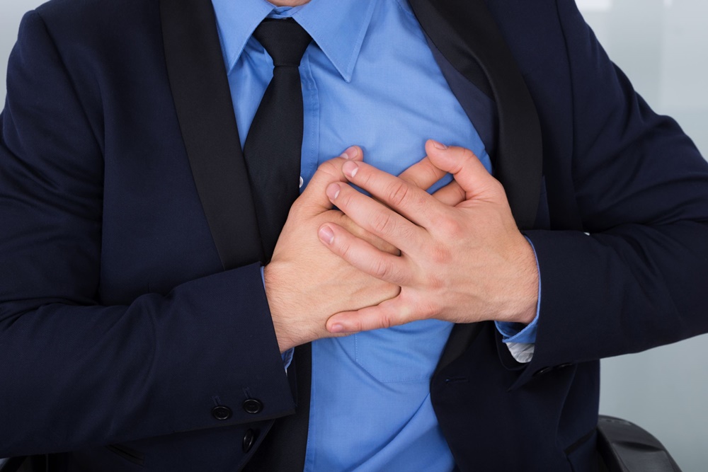 35690615 - close-up of a businessman suffering from heart pain